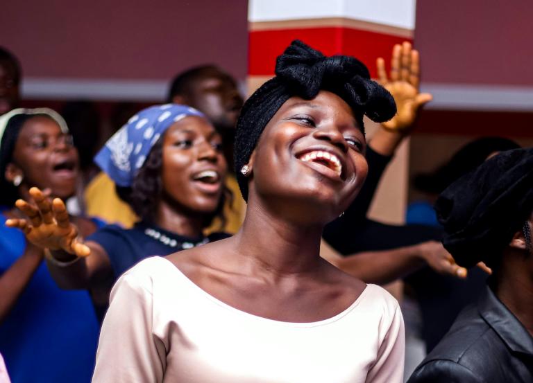Woman happy in worship